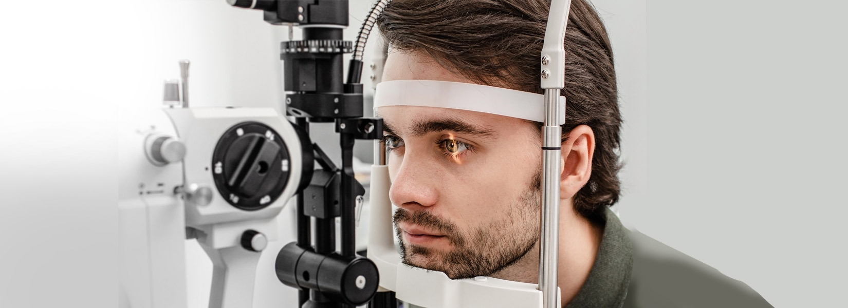 young man during eye exam in Erie